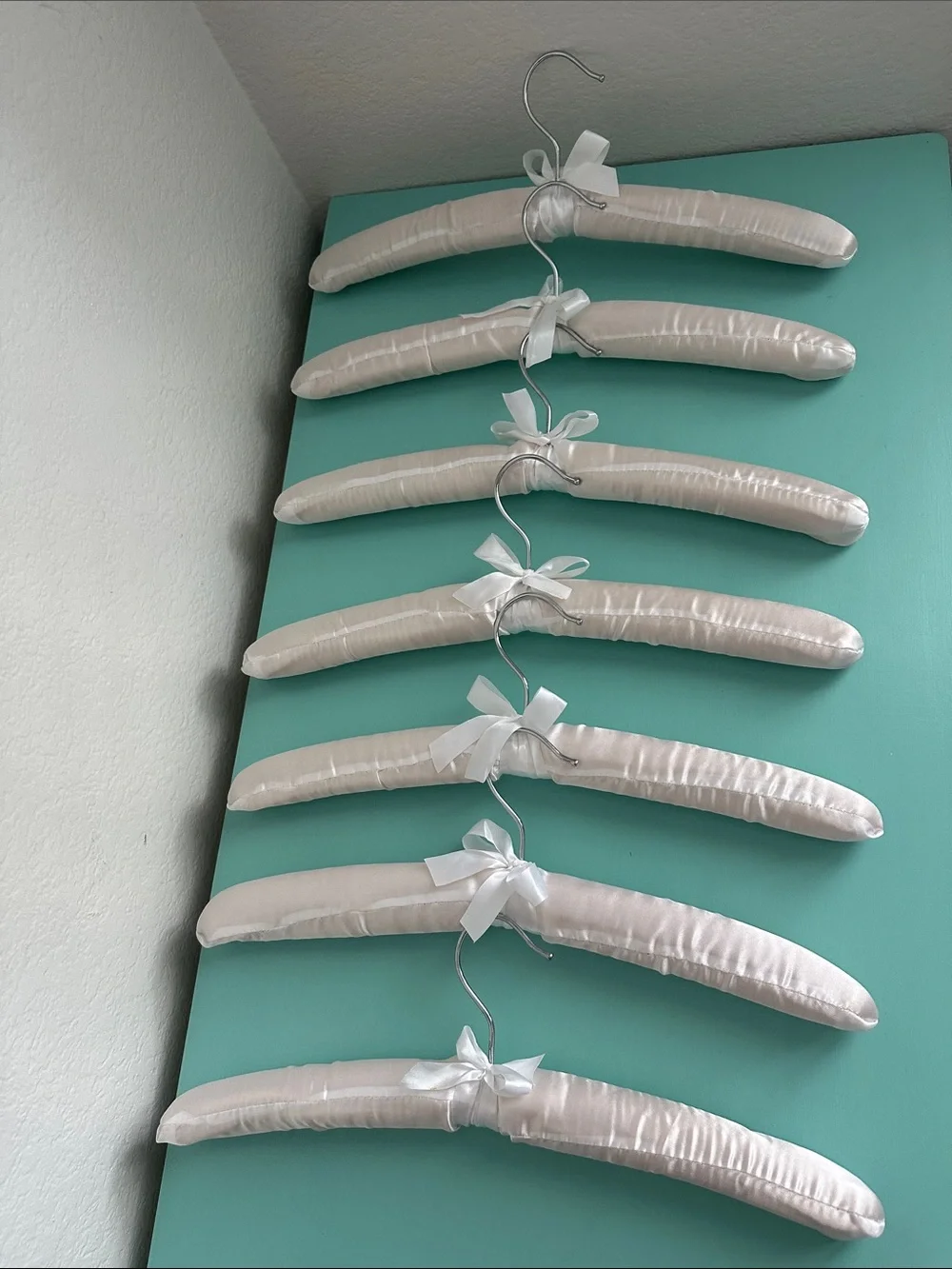 Satin white glossy padded heavy duty hangers-set of 7ct. with a bow-brand new